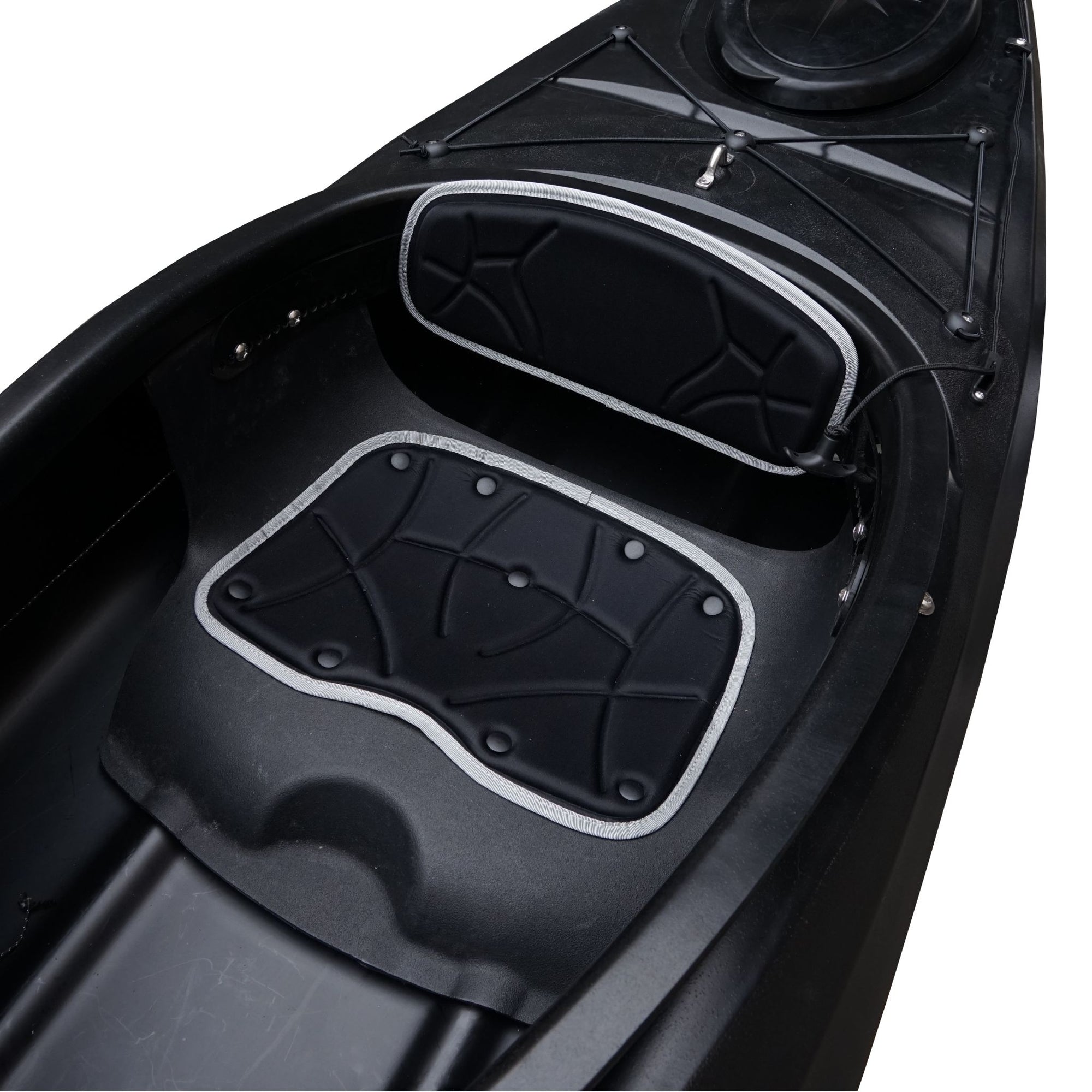 Deck detail of the Cambridge Kayaks touring kayak in black, highlighting watertight hatch, footrests, and bungee deck cords.