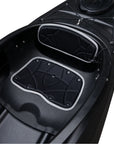 Deck detail of the Cambridge Kayaks touring kayak in black, highlighting watertight hatch, footrests, and bungee deck cords.