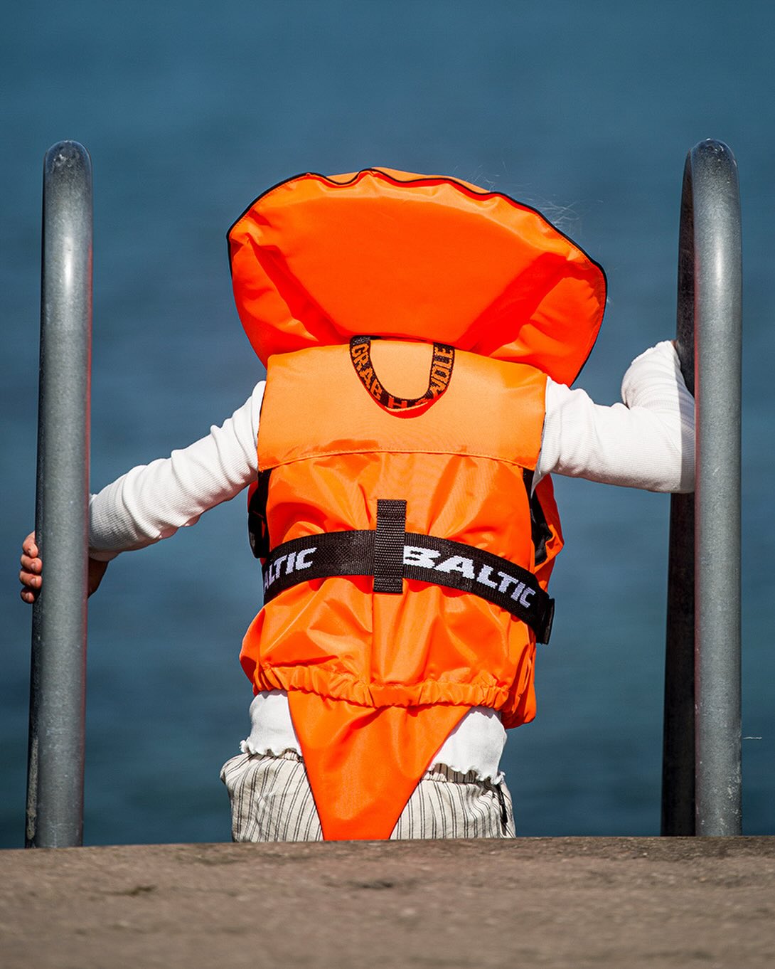 Baltic split front kids lifejacket orange showing foam panel construction