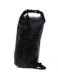 Profile view of the Cambridge Kayaks 10 L Roll Top Dry Bag in grey, featuring the flexible waterproof material and sturdy base that allows it to stand upright when filled.