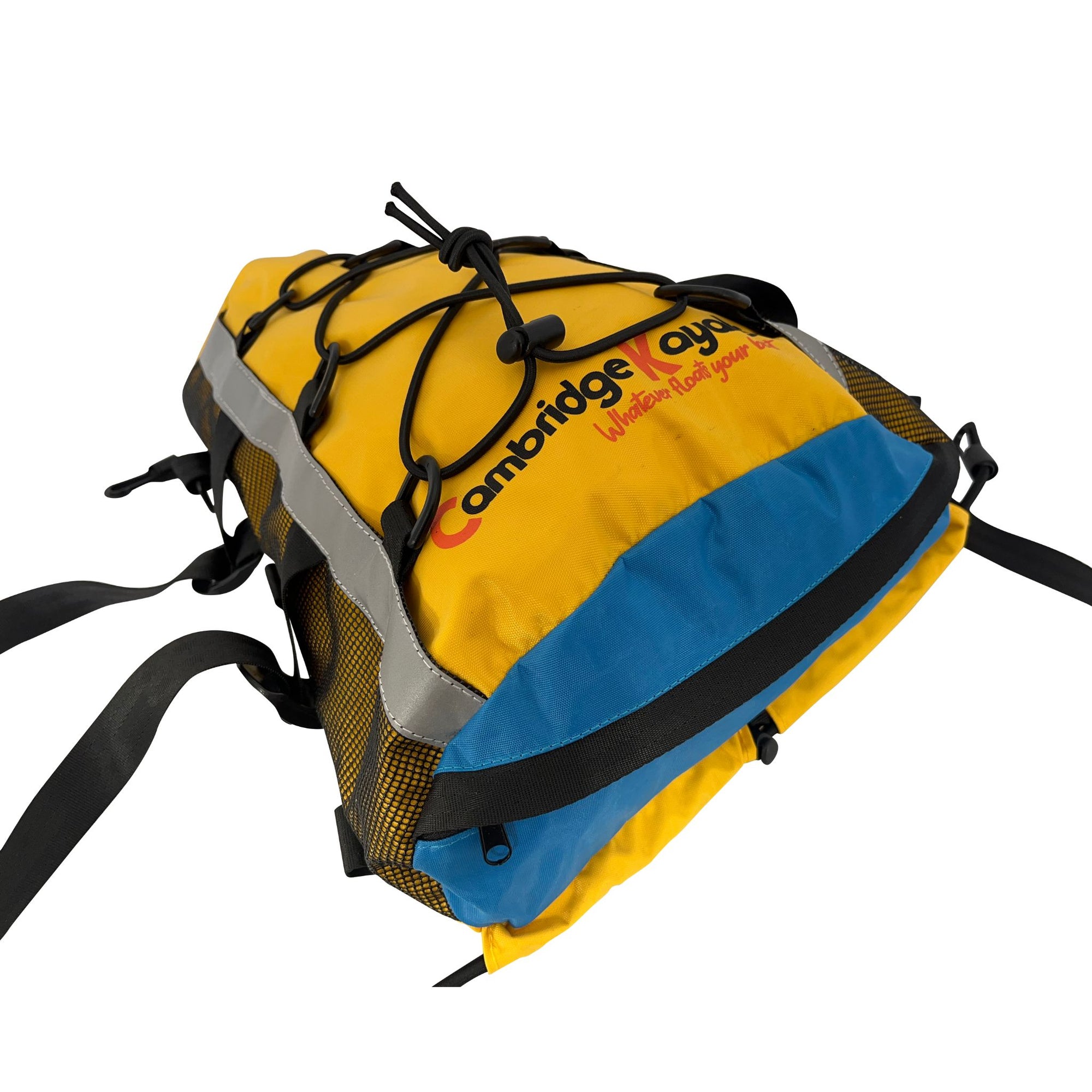 Front angled view of the Cambridge Kayaks yellow and blue Access Deck Bag showing the bungee cord top, side mesh pockets, and multiple securing straps for easy kayak attachment.