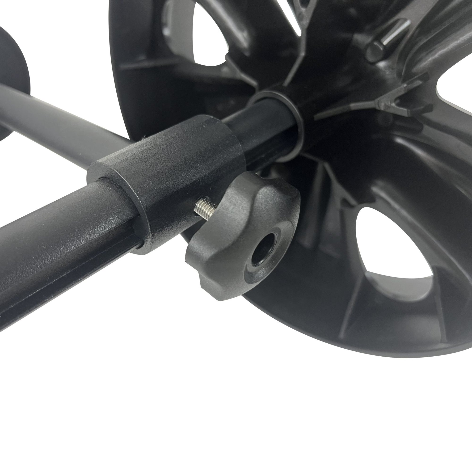 Close-up of the Cambridge Kayaks Adjustable H-Trolley wheel, showing the detailed tread pattern and reinforced hub designed for traction and long-lasting durability on various terrains.