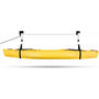 Cambridge Kayaks ceiling hoist system suspending a yellow kayak horizontally with adjustable straps and pulleys.
