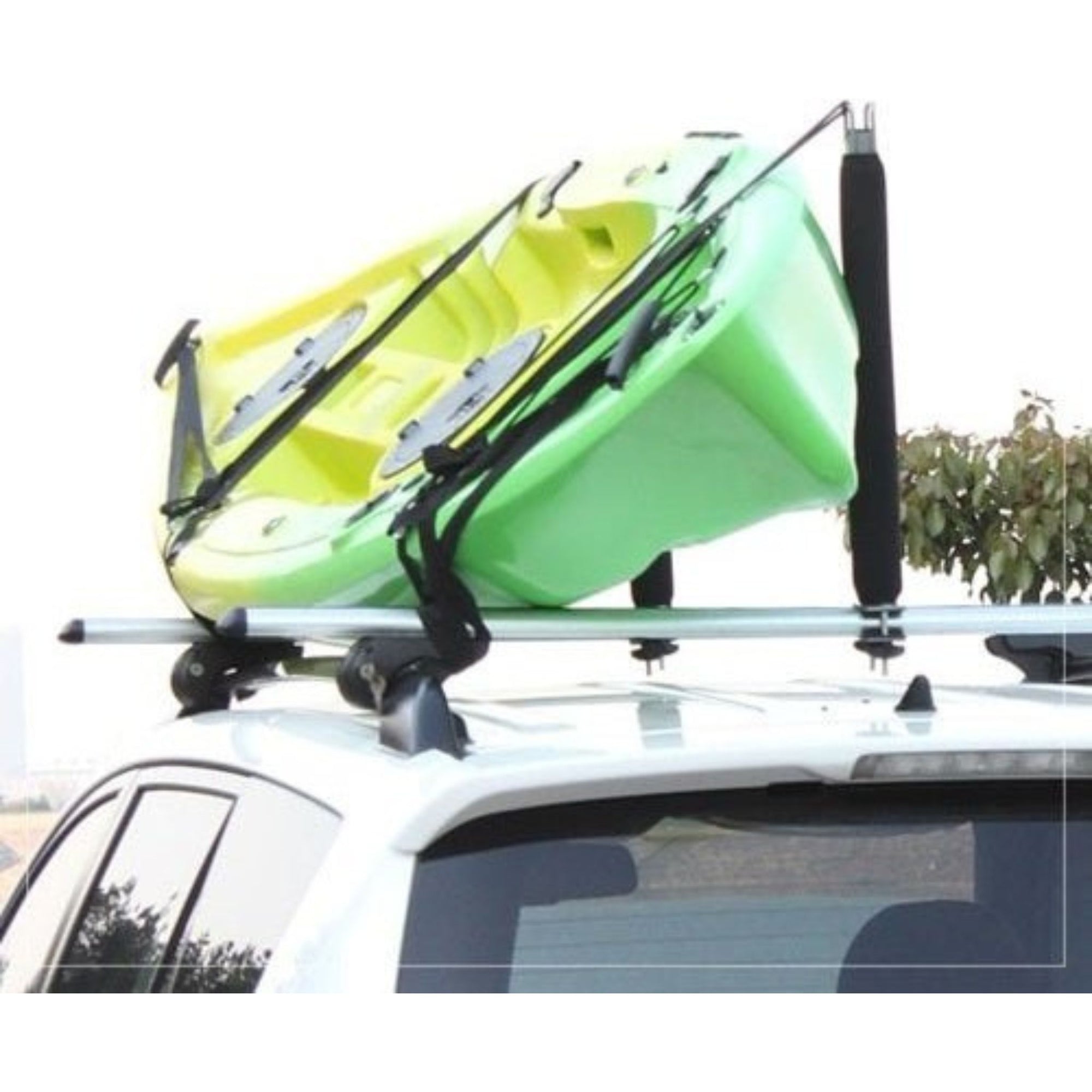 Cambridge Kayaks Roof Bar Centre Post installed and holding a green kayak securely on a vehicle roof, highlighting practical use during transport.