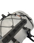 Angled view of the Cambridge Kayaks 15L waterproof dry deck bag highlighting the side compression straps, reinforced clips, and secure roll-top design.