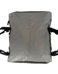 Flat back view of the Cambridge Kayaks Deluxe 15L Dry Deck Bag showing attachment points and waterproof sealed surface for secure fit on kayak decks.