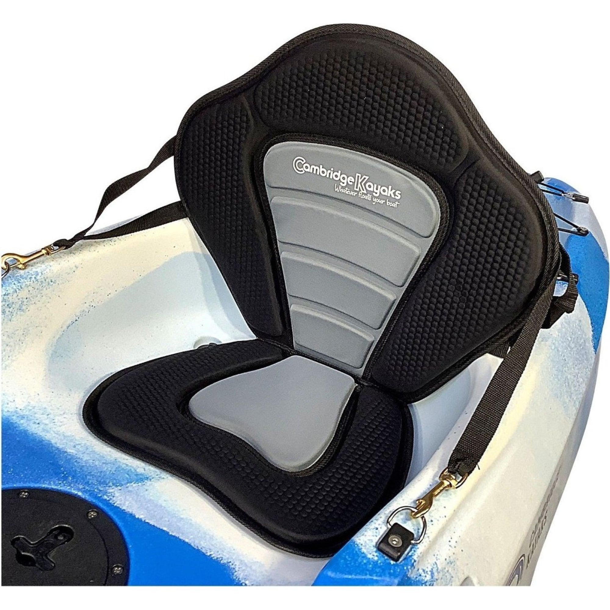 Side view of the Cambridge Kayaks Deluxe Kayak Seat attached to a kayak, displaying adjustable straps and ergonomic seat padding.