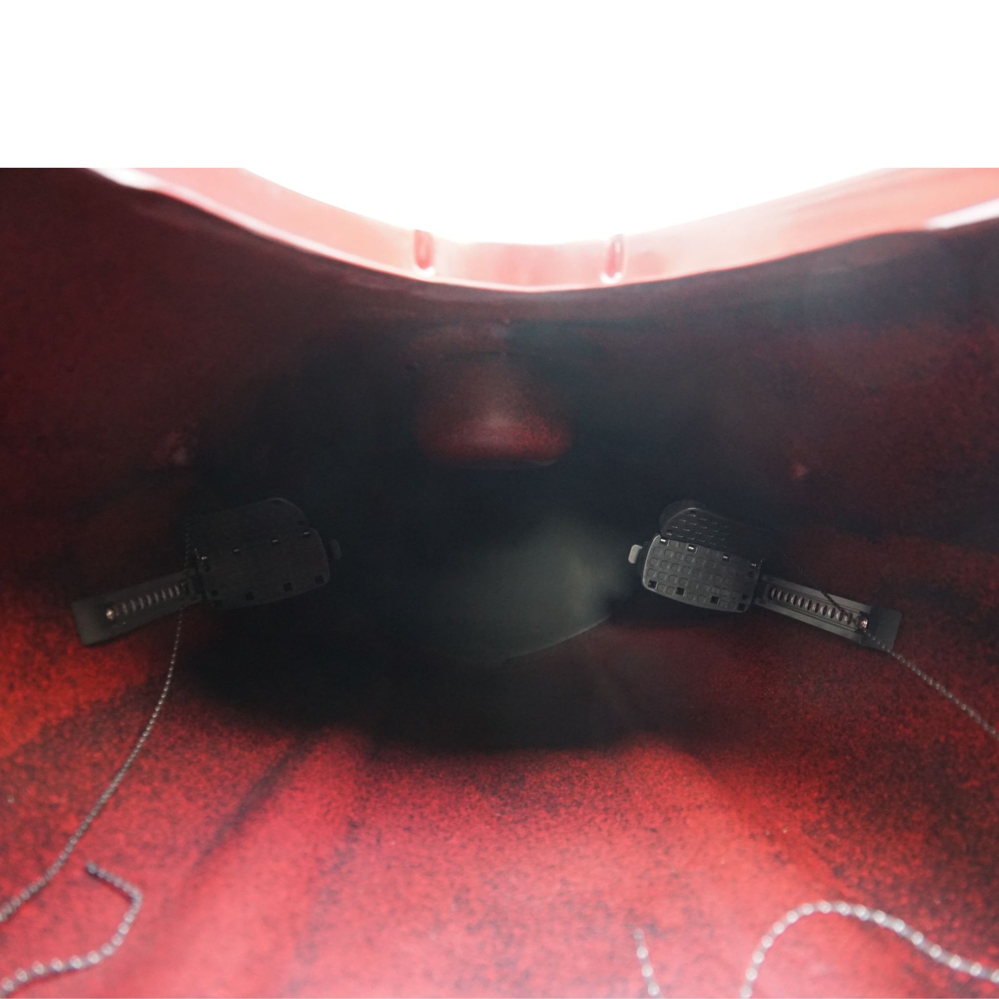 Deck detail of the Cambridge Kayaks Explorer 430 sit inside kayak in red black fade, featuring rear hatch, safety lines, and strong deck hardware.