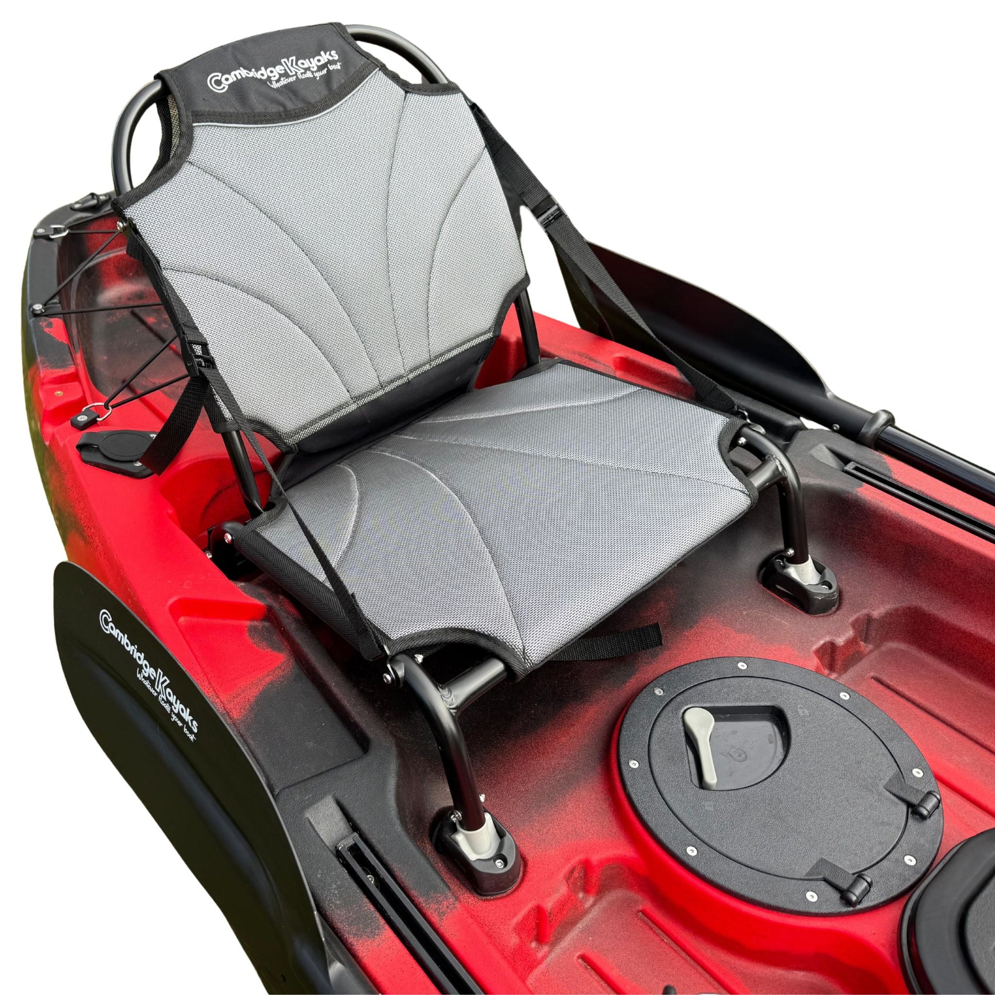 Cambridge Kayaks aluminium fishing seat installed on a red kayak, demonstrating its stable mounting and ergonomic high-back design.