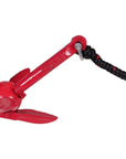 Cambridge Kayaks red folding anchor fully extended, attached to the rope and float for kayak mooring use.