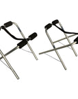 Pair of Cambridge Kayaks folding stands made from silver metal tubing with padded supports and black securing straps.