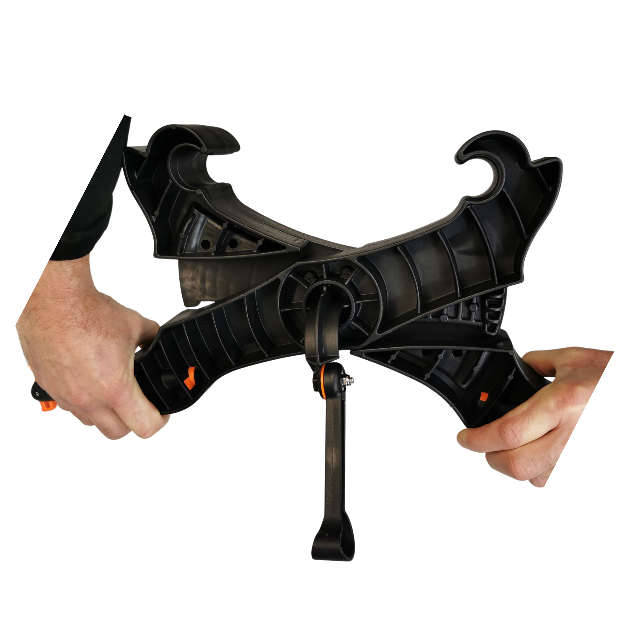 Hands demonstrating the setup process of the Cambridge Kayaks Heavy Duty Kayak Trolley, assembling the central frame and kickstand for stability during loading.
