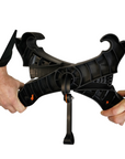 Hands demonstrating the setup process of the Cambridge Kayaks Heavy Duty Kayak Trolley, assembling the central frame and kickstand for stability during loading.