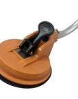 Close-up view of one of the strong orange suction cups on the Cambridge Kayaks Loading Roller Assist, showing sturdy mounting and locking mechanism.