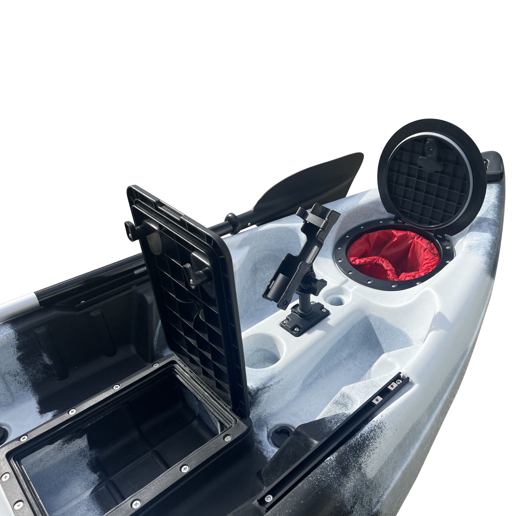 Angled rear view of the Cambridge Kayaks Manta 9ft fishing kayak in black white camo. Highlights hull shape, seat position, and storage for rods and equipment.