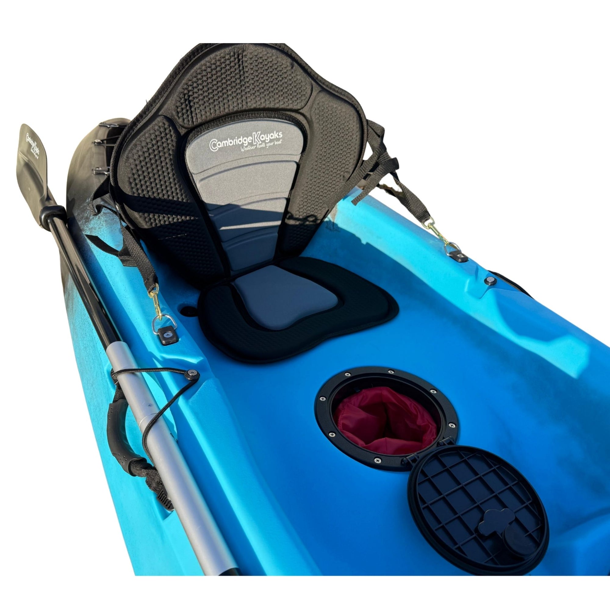 Close-up of the Cambridge Kayaks Neptune kayak in blue and black, showing the padded seat and waterproof central storage hatch with a red dry bag — designed for keeping essentials secure during your adventures.
