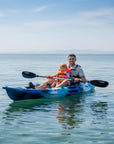 Adult and child using Cambridge Kayaks Quest single 1 plus 1 sit on top kayak on calm sea