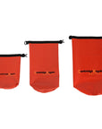 Set of three red Cambridge Kayaks waterproof dry bags displayed upright, each with roll-top sealing and black buckles for secure, watertight protection of belongings.