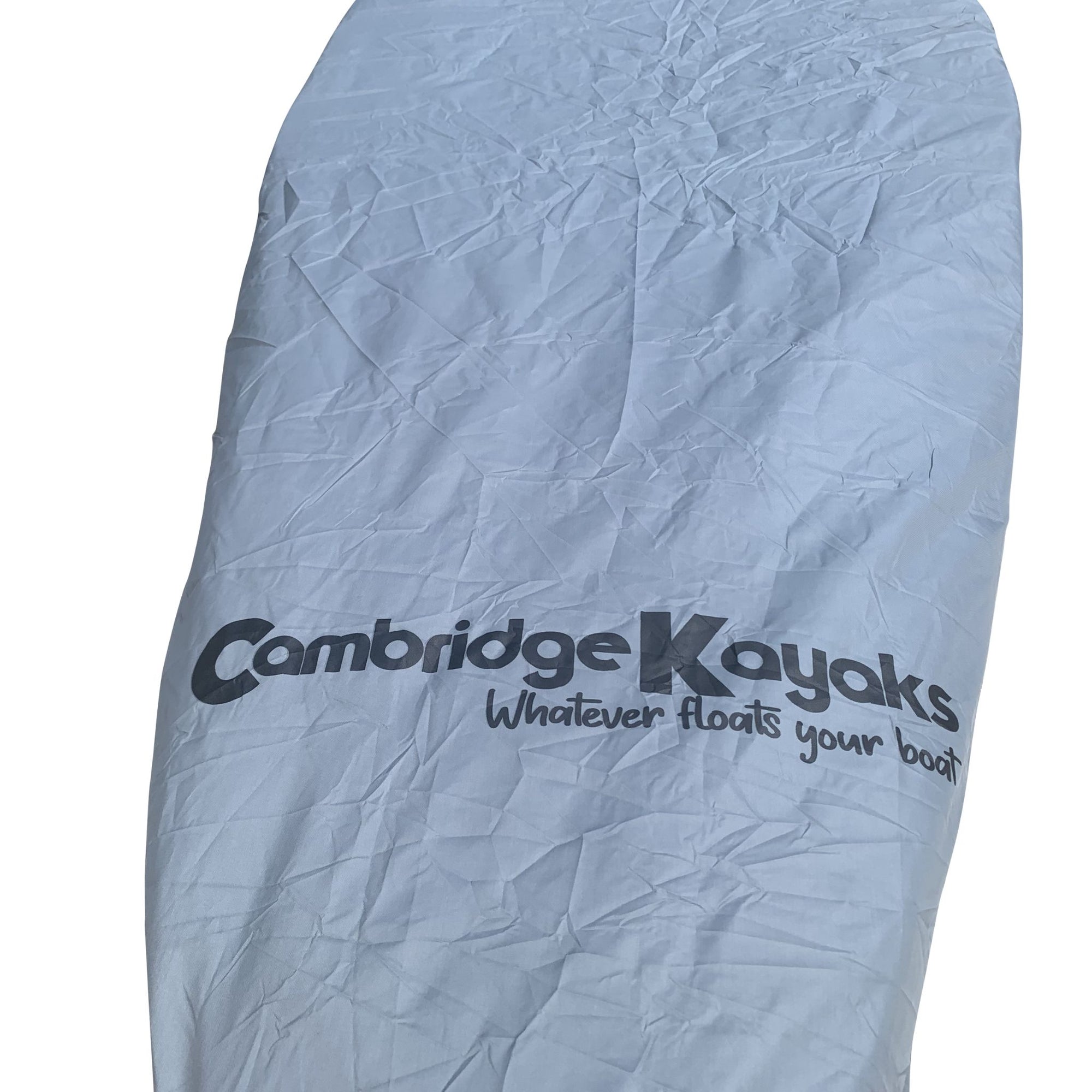 Close-up of the Cambridge Kayaks logo printed on the silver kayak protection cover, highlighting the reinforced material that provides UV and water resistance.