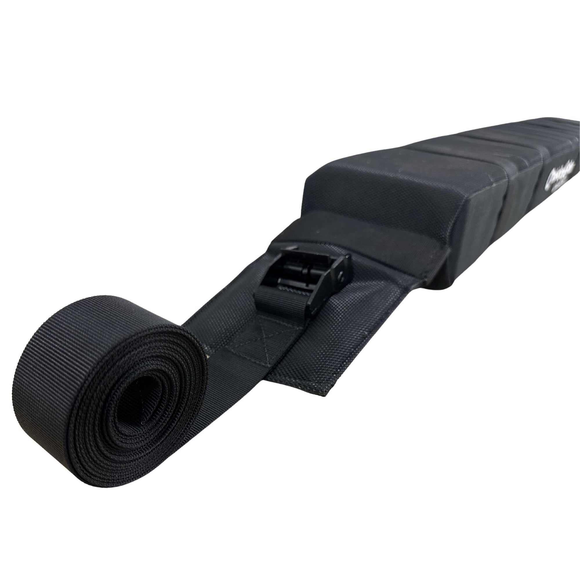 Cambridge Kayaks soft roof rack rolled up for storage, showing compact design and adjustable strap buckles.