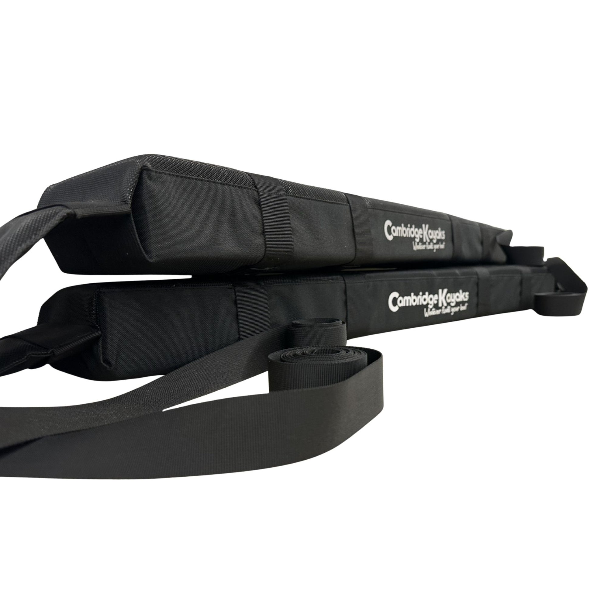 Side view of the Cambridge Kayaks soft roof rack showing both pads stacked with securing straps attached.