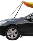 Kayak secured to car using Cambridge Kayaks Bonnet and Boot Tie-Down Strap system, showing the front of the vehicle with straps attached to the kayak for stable roof transport.