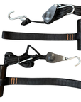 Cambridge Kayaks tie-down bonnet and boot strap set, featuring durable black webbing straps with coated metal hooks and pulley system for securing kayaks to vehicles.