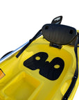 Detailed view of the Cambridge Kayaks Trekker junior kayak seat showing the ergonomic padded backrest, textured footwells for grip, and central storage compartment, designed for comfort and stability.