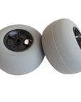 Close up of large balloon wheels for kayak trolley designed for easy transport over sand and soft ground