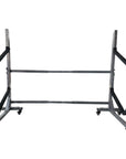 Two tier freestanding kayak storage rack with wide stabilizing base and angled foam padded support arms, durable steel construction designed to safely store and organize two kayaks in a garage, storage unit, or boat house