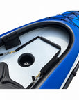 Voyagair 1 blue inflatable kayak cockpit showing footrest, storage pocket and interior