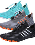 Pair of Rink kayaking water shoes in grey and turquoise with orange soles, shown side by side to highlight design and ventilation.